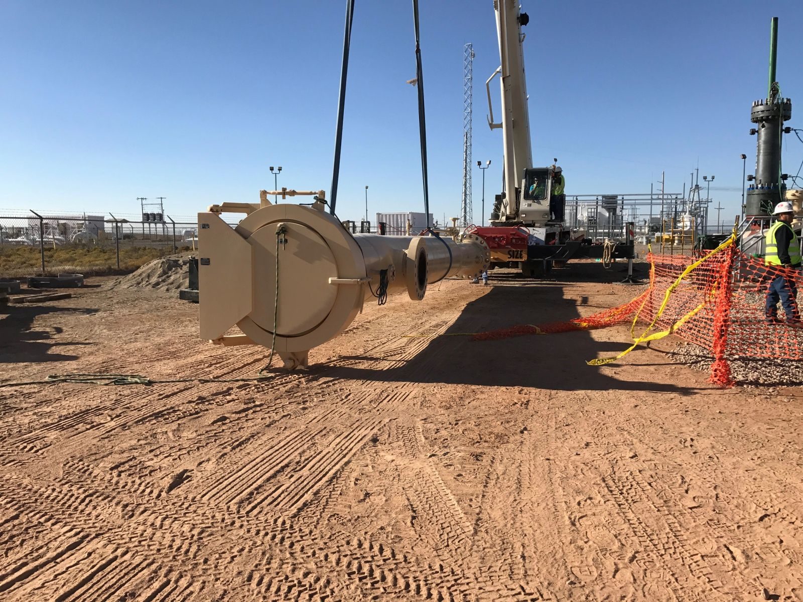 Pig launcher being set by crane